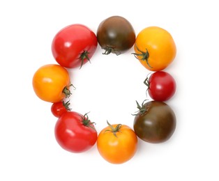 Photo of Different ripe juicy tomatoes isolated on white, top view