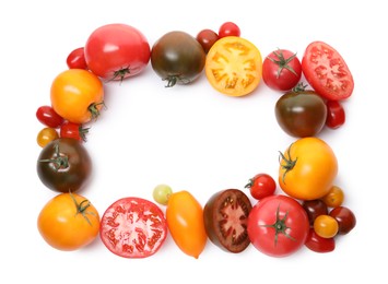 Photo of Frame of different ripe juicy tomatoes isolated on white, top view