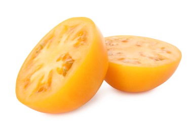 Photo of Pieces of ripe yellow tomato isolated on white