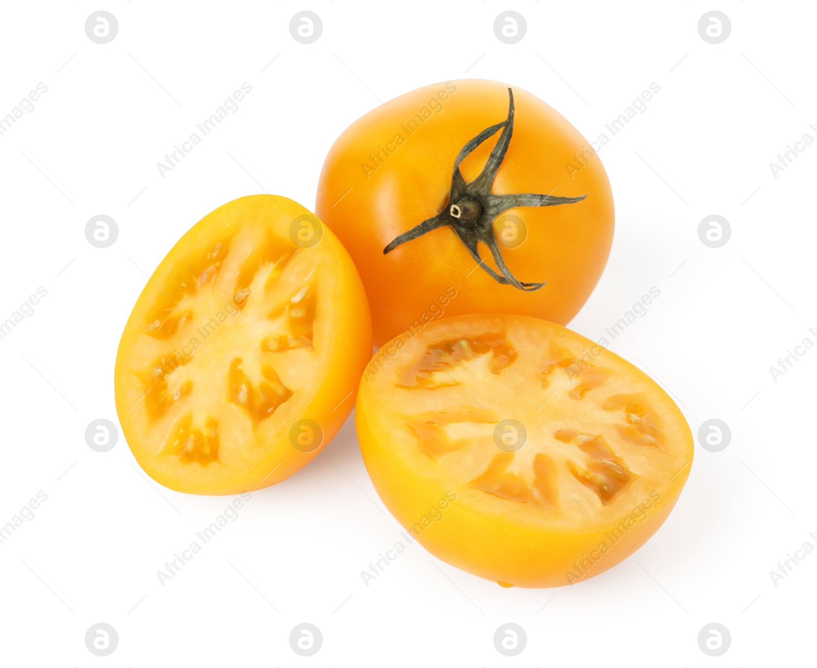 Photo of Whole and cut yellow tomatoes isolated on white