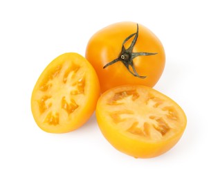 Photo of Whole and cut yellow tomatoes isolated on white