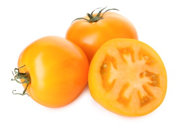 Photo of Whole and cut yellow tomatoes isolated on white