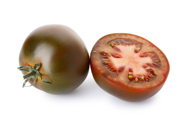 Photo of Whole and cut brown tomatoes isolated on white