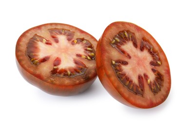 Photo of Pieces of ripe brown tomato isolated on white