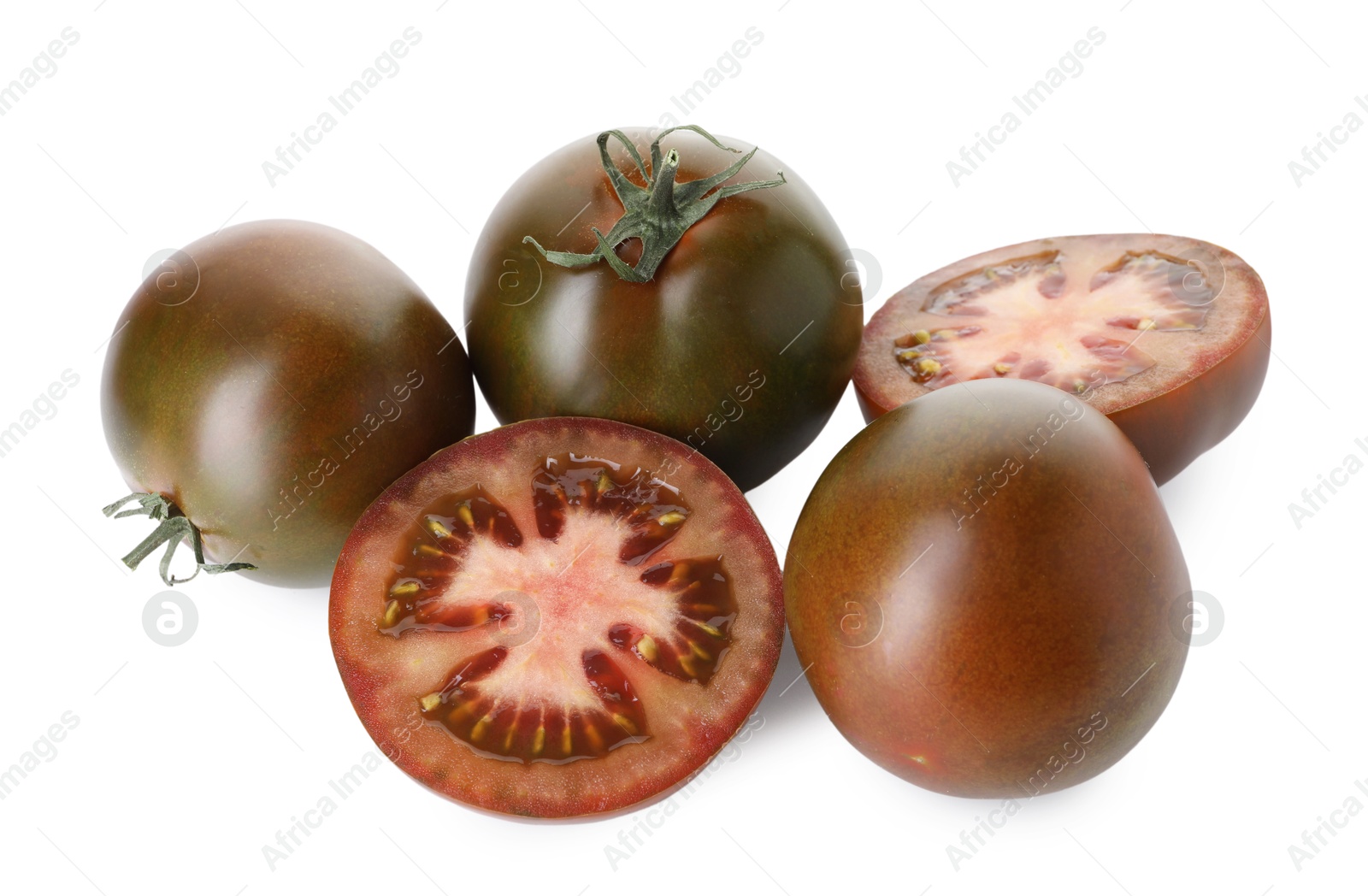 Photo of Whole and cut brown tomatoes isolated on white