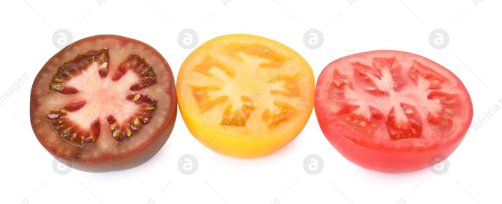 Pieces of different ripe juicy tomatoes isolated on white Photo of Pieces of different ripe juicy tomatoes isolated on white
