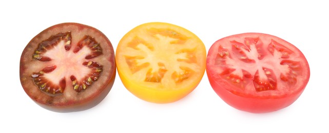 Photo of Pieces of different ripe juicy tomatoes isolated on white