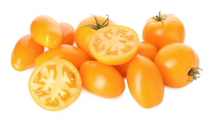 Photo of Many ripe yellow tomatoes isolated on white