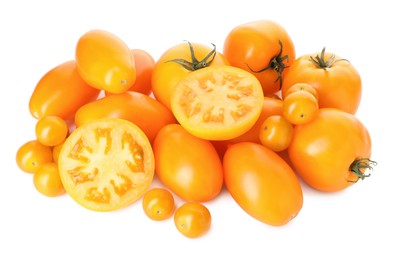 Photo of Many ripe yellow tomatoes isolated on white