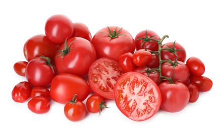 Photo of Many ripe red tomatoes isolated on white