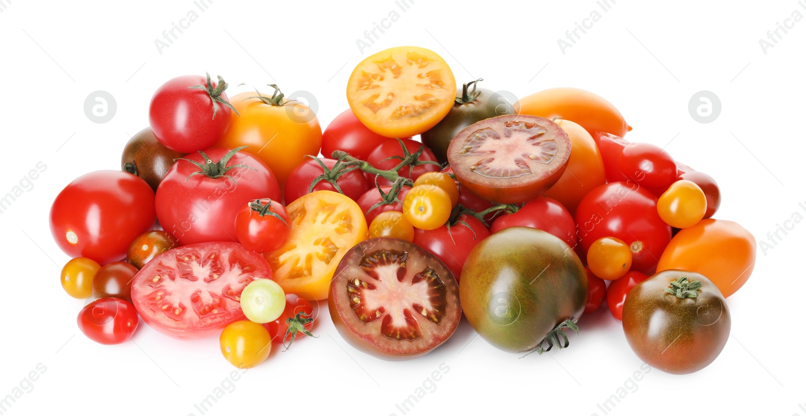 Photo of Heap of different ripe juicy tomatoes isolated on white