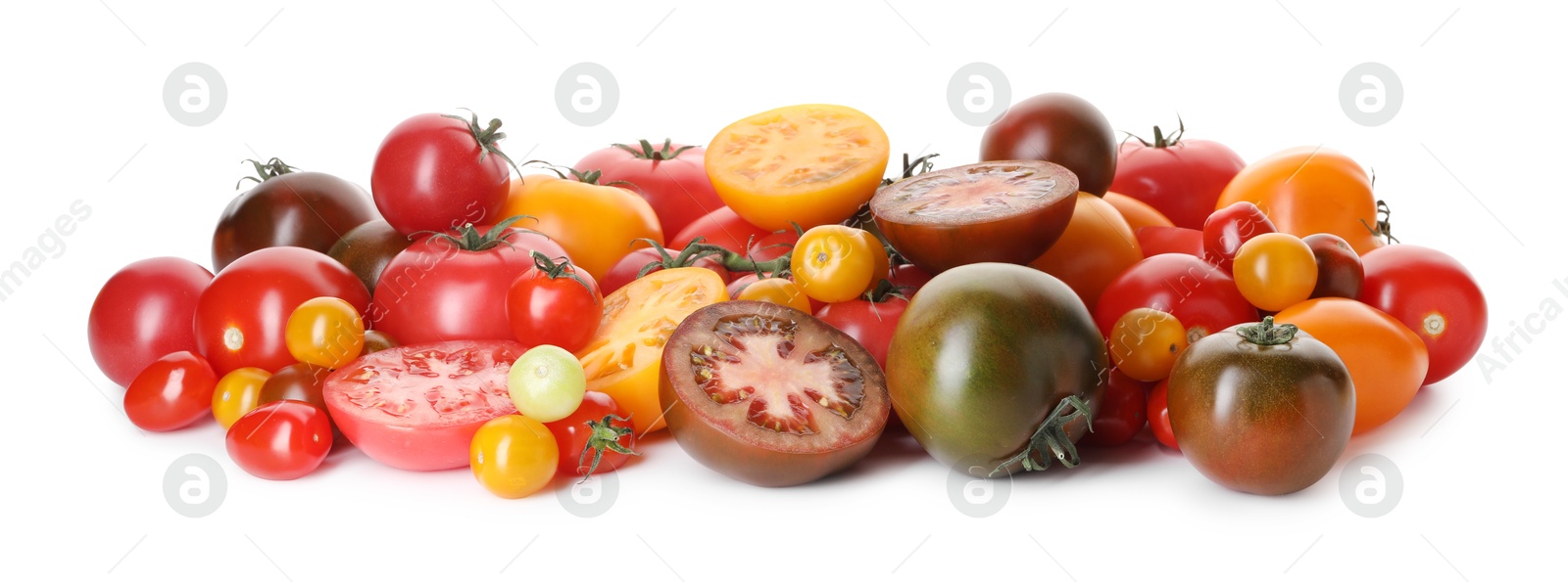 Photo of Heap of different ripe juicy tomatoes isolated on white