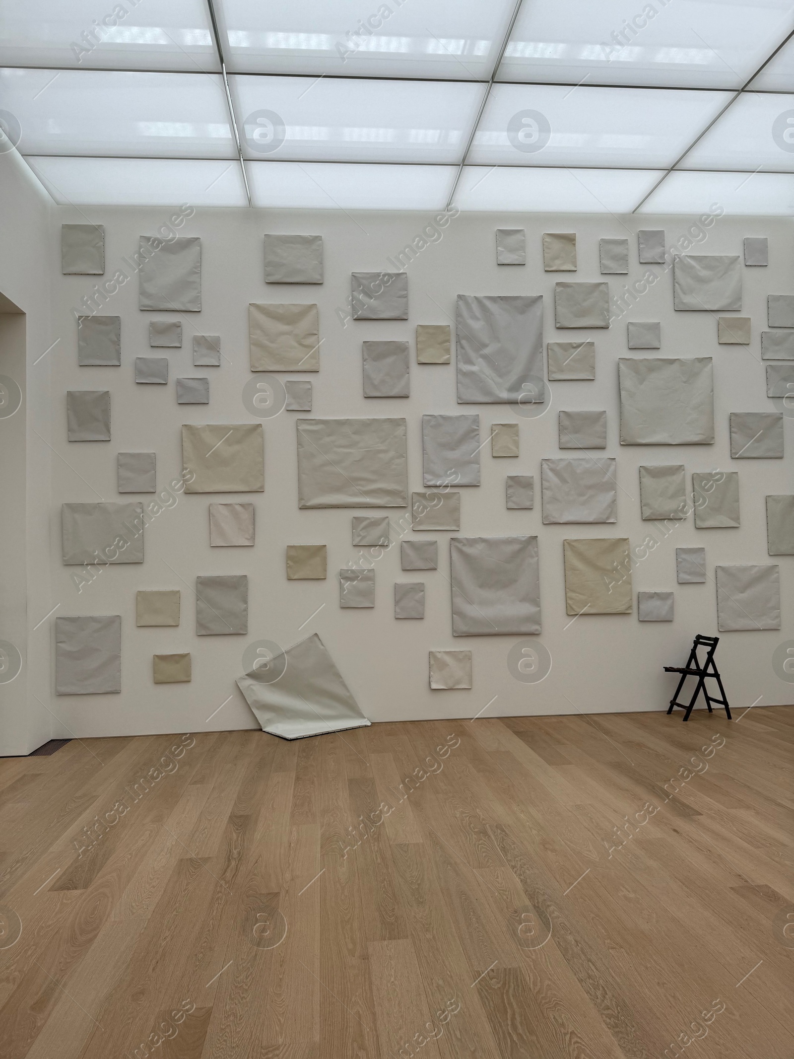Wassenaar, Netherlands - June 28, 2025: Installation of blank canvases on wall at Voorlinden museum Photo of Wassenaar, Netherlands - June 28, 2025: Installation of blank canvases on wall at Voorlinden museum