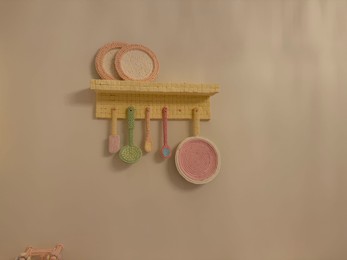 Photo of Wassenaar, Netherlands - June 28, 2025: Installation with kitchen utensils made of candies at Voorlinden museum