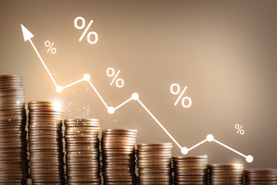 Image of Percent signs and arrow above stacked coins against dark beige background