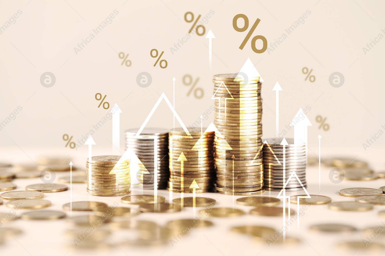 Image of Percent signs, arrows and stacked coins against beige background