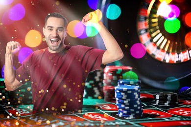 Image of Happy gambler celebrating victory. Multiple exposure with casino chips and roulette