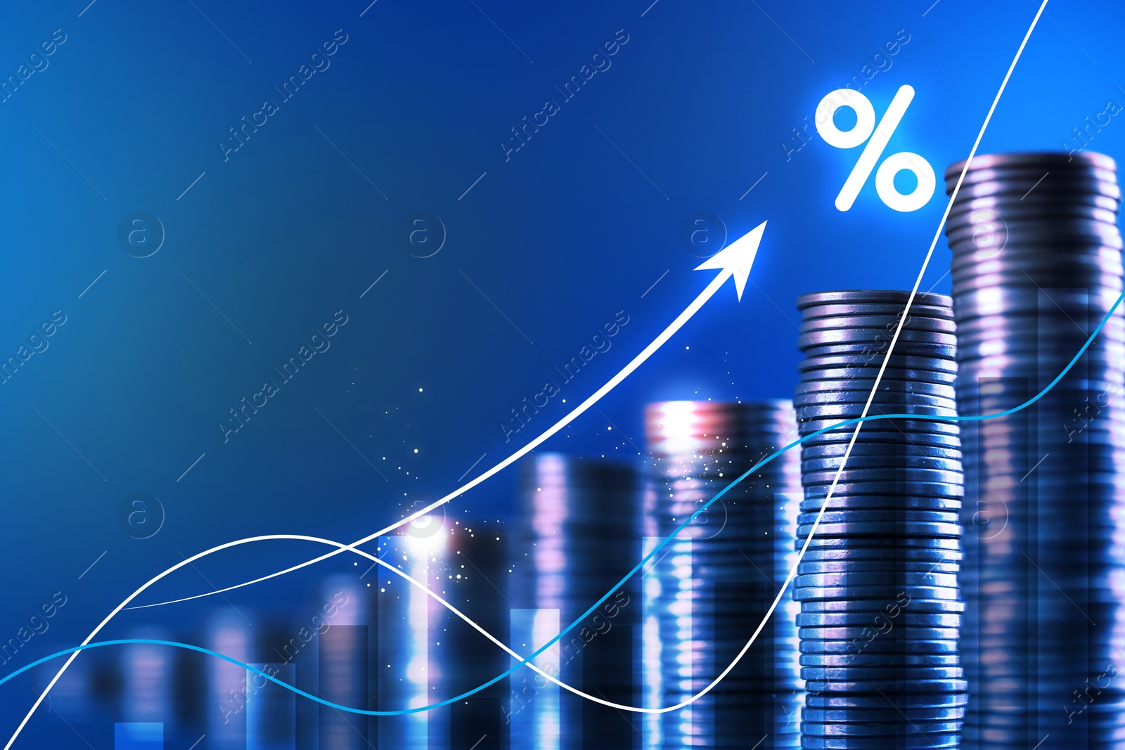 Percent sign and arrow above stacked coins against blue background Image of Percent sign and arrow above stacked coins against blue background