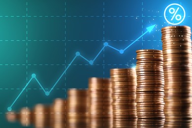 Image of Percent sign and arrow above stacked coins against blue gradient background