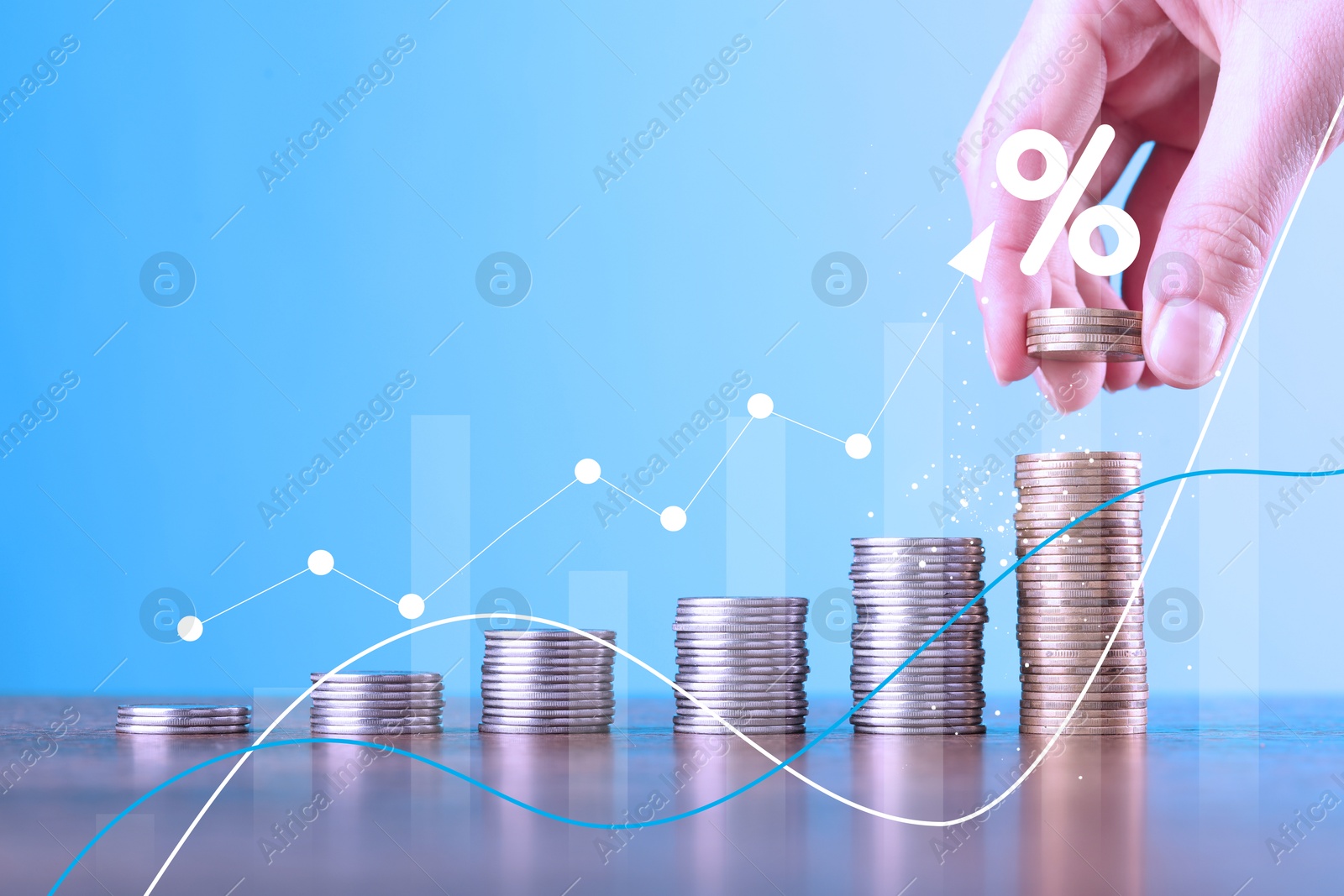 Image of Woman stacking coins at table, closeup. Graphs and percent sign above stacks