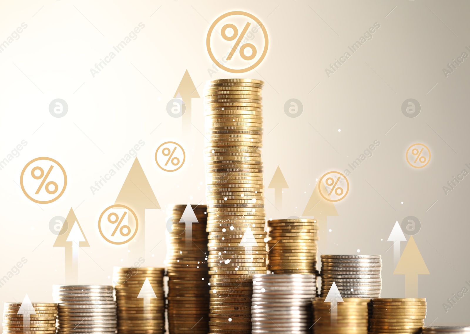 Image of Percent signs, arrows and stacked coins against beige background