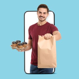 Image of Food delivery service worker giving online order out of mobile phone display. Light blue background