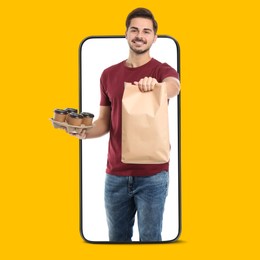 Image of Food delivery service worker giving online order out of mobile phone display. Orange background