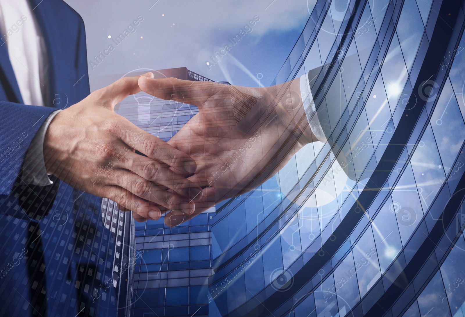 Business people shaking hands, double exposure with buildings. Success in partnership, deal, agreement Image of Business people shaking hands, double exposure with buildings. Success in partnership, deal, agreement