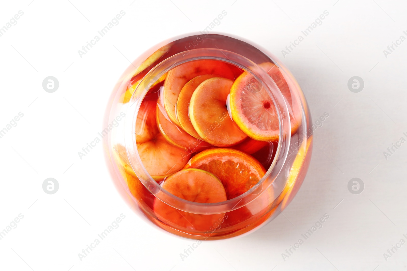 Tasty fruity punch on white table, top view. Refreshing drink Photo of Tasty fruity punch on white table, top view. Refreshing drink