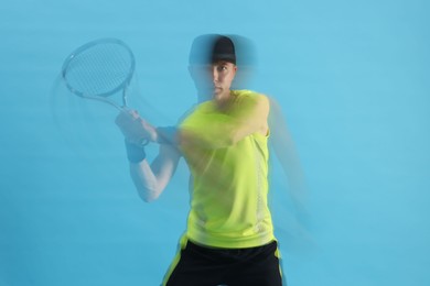 Photo of Man with racket playing tennis on light blue background, motion blur effect