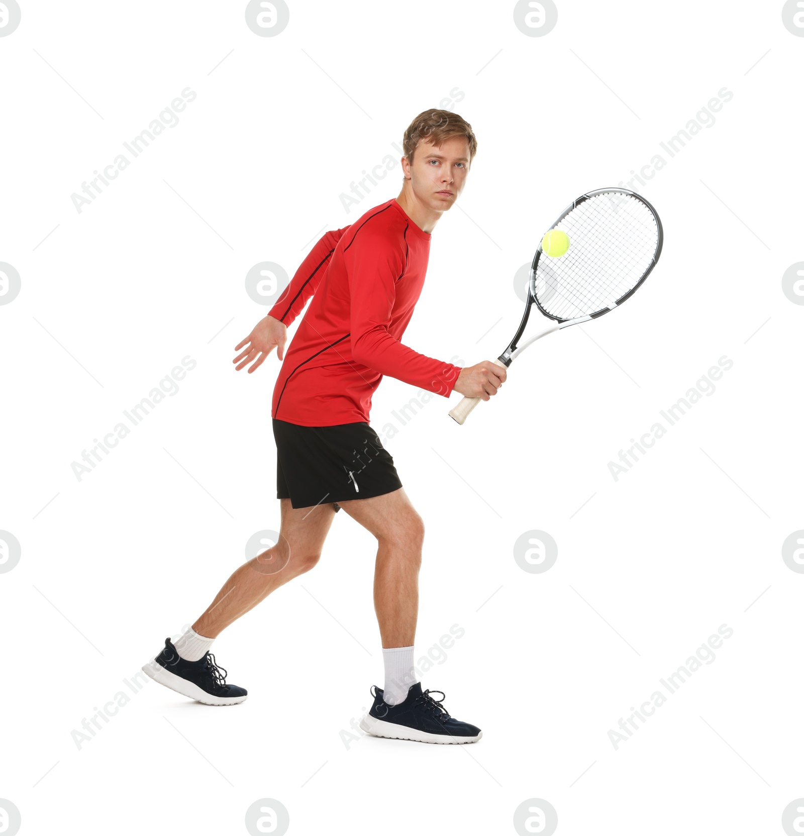 Photo of Man with racket playing tennis on white background