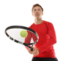 Photo of Man with tennis racket and ball on white background, low angle view