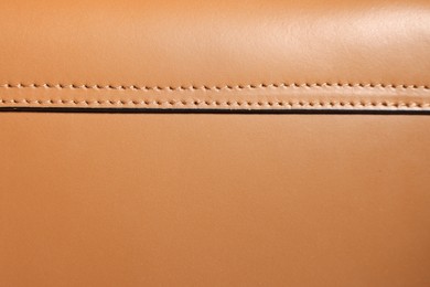 Photo of Texture of natural leather as background, top view