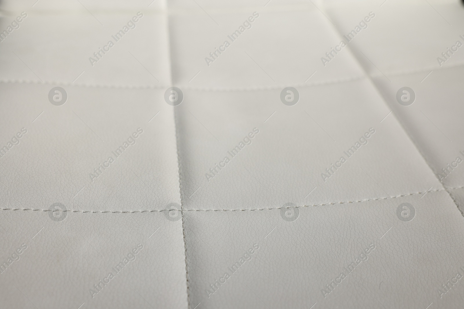 Photo of Texture of natural leather as background, closeup