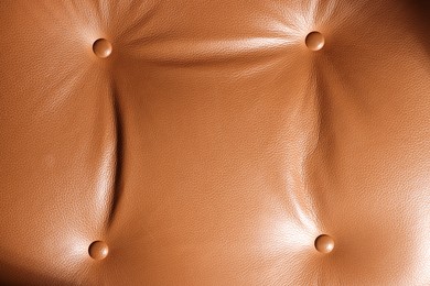 Photo of Texture of natural leather as background, top view