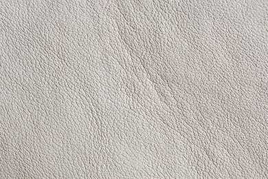 Photo of Texture of natural leather as background, top view