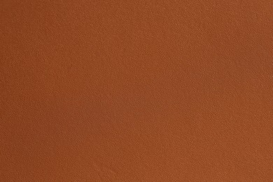 Photo of Texture of natural leather as background, top view