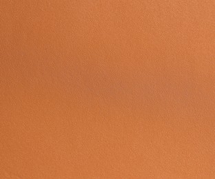 Photo of Texture of natural leather as background, top view