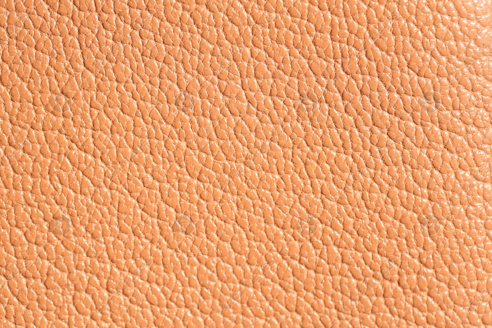 Photo of Texture of natural leather as background, closeup