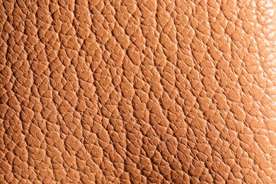 Photo of Texture of natural leather as background, top view