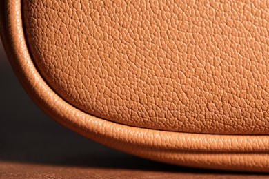 Photo of Leather bag on color surface, closeup view