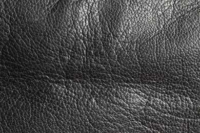 Photo of Texture of natural leather as background, top view
