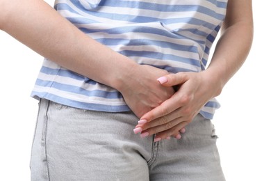 Photo of Woman suffering from cystitis symptoms on white background, closeup