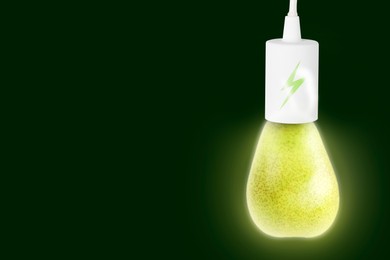 Image of Electricity and nature. Pear as glowing light bulb with lightning symbol against dark green background. Space for text