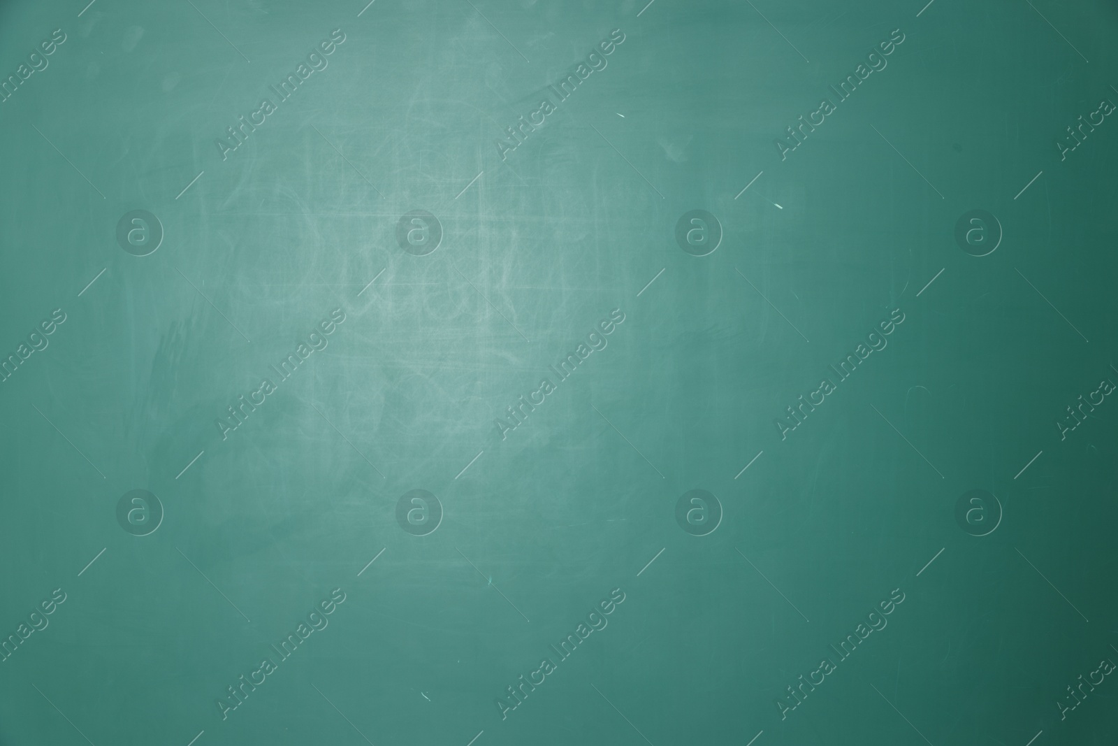 Photo of Blank green chalkboard as background, closeup view