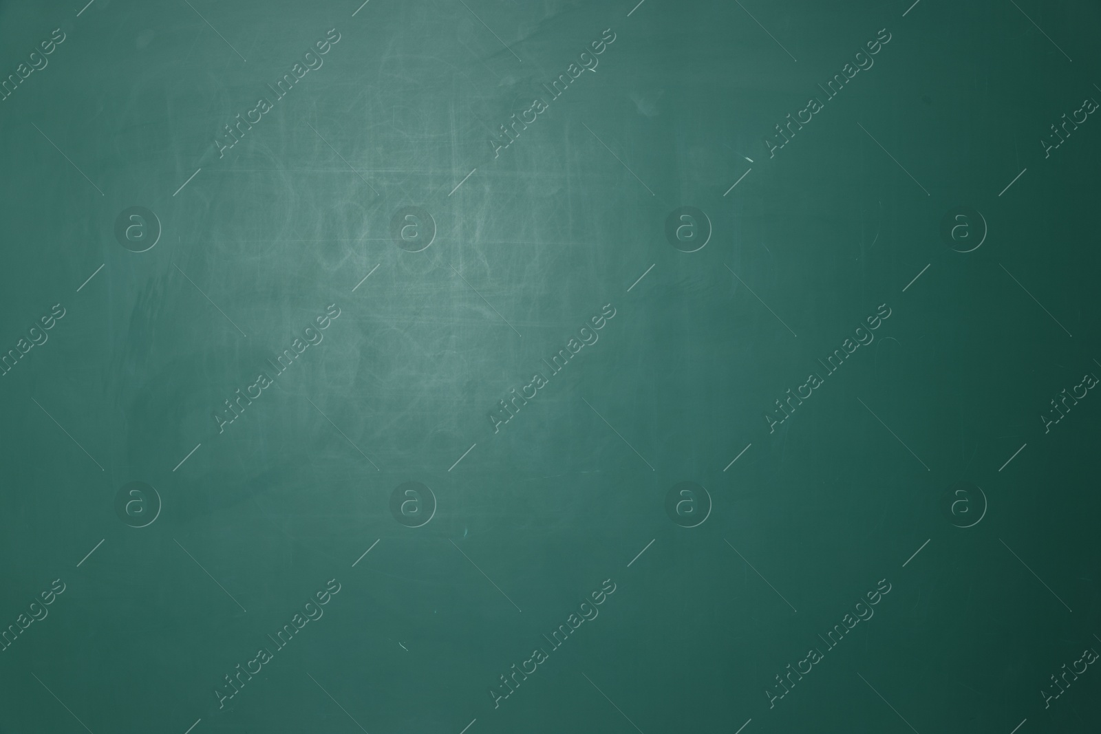 Photo of Blank green chalkboard as background, closeup view
