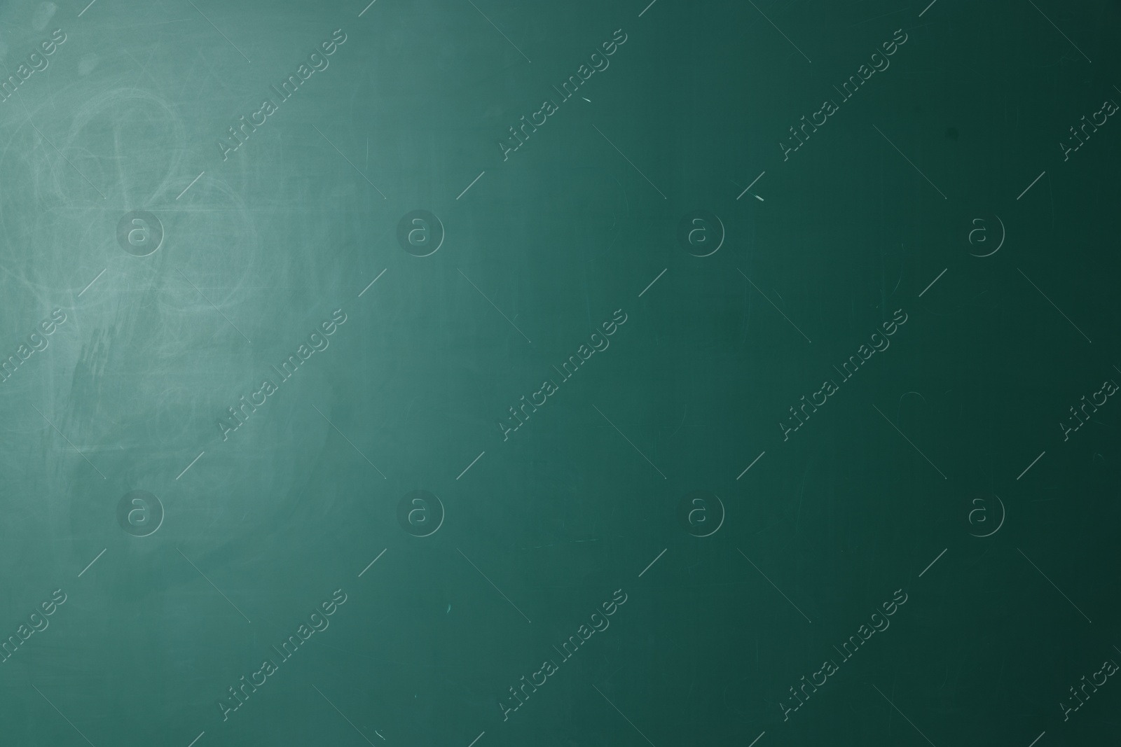Photo of Blank green chalkboard as background, closeup view