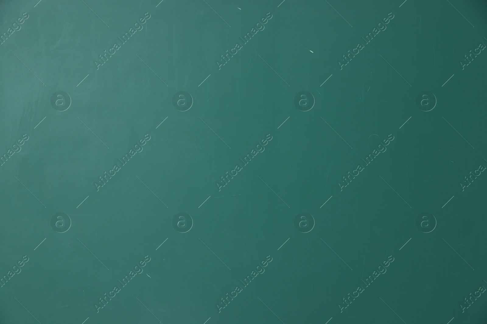 Photo of Blank green chalkboard as background, closeup view