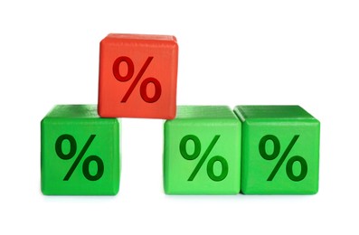 Image of Green cubes with percent signs and one red against white