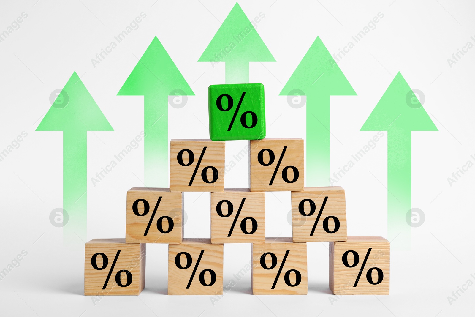 Image of Percent signs on wooden cubes and arrows against white background